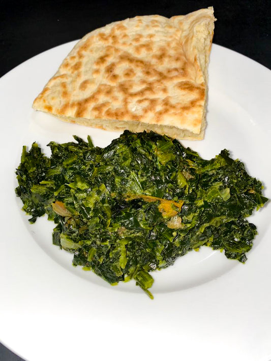 Bhagee cooked West Indian spinach with garlic and onion